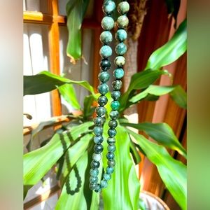 Green marble necklace made from